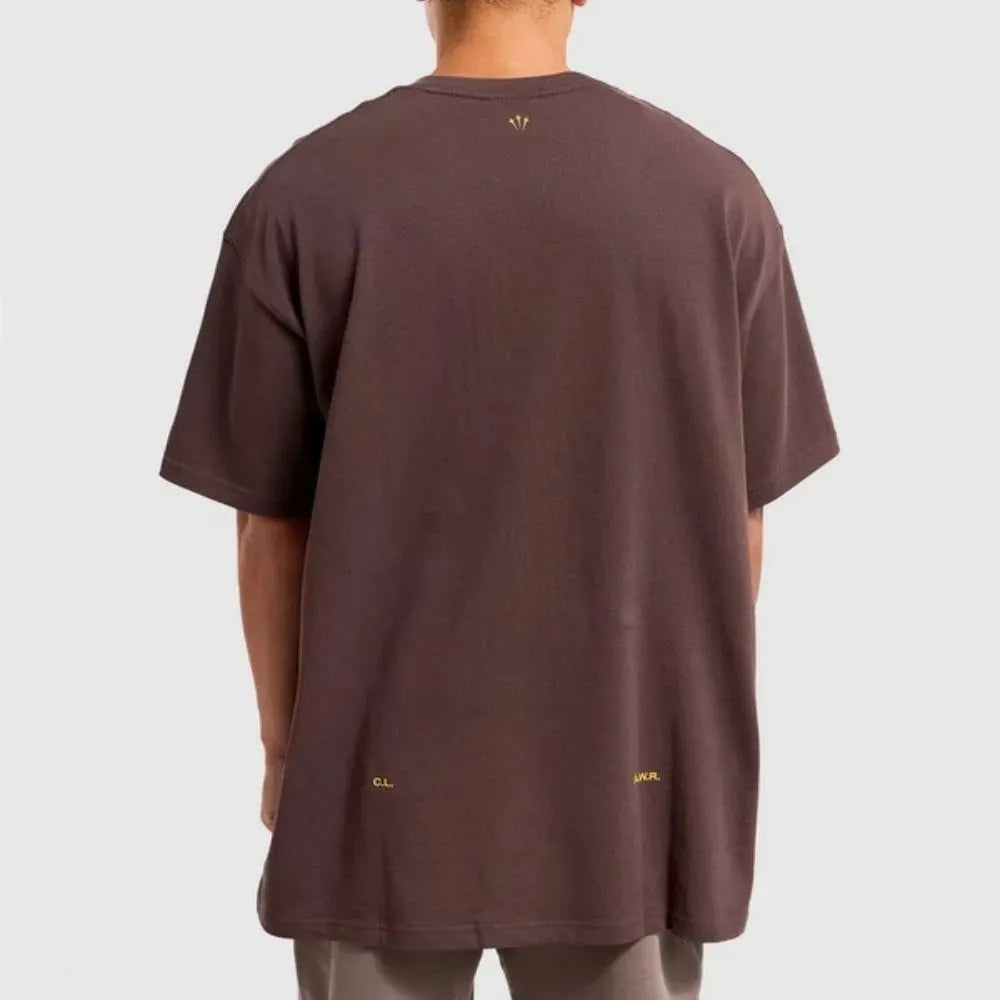 Camiseta Nocta x Nike Marrom